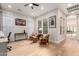 Bright living room featuring hardwood floors, neutral paint, recessed lighting, and modern decor at 28834 N 68Th Ave, Peoria, AZ 85383