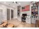 Well-appointed home office with custom built-ins, desk, and large window offering natural light at 28834 N 68Th Ave, Peoria, AZ 85383