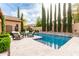 Beautiful backyard pool and patio area, perfect for outdoor living and entertaining with tasteful landscaping at 28834 N 68Th Ave, Peoria, AZ 85383