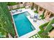 Stunning backyard pool with lounge area, grill, and elegant landscaping for outdoor enjoyment at 28834 N 68Th Ave, Peoria, AZ 85383