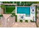Backyard aerial view showing a rectangular pool, patio, landscaping, and privacy wall at 28834 N 68Th Ave, Peoria, AZ 85383