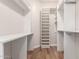 Well-organized walk-in closet with custom shelves and drawers providing ample storage space at 28834 N 68Th Ave, Peoria, AZ 85383