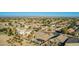 An aerial view showcasing a Gathering-friendly community with houses and desert landscaping at 29794 N Little Leaf Dr, San Tan Valley, AZ 85143