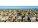 An aerial view showing a community with tree-lined streets and well-maintained homes at 29794 N Little Leaf Dr, San Tan Valley, AZ 85143
