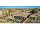 A relaxing backyard with covered patio area perfect for outdoor dining and entertaining at 29794 N Little Leaf Dr, San Tan Valley, AZ 85143