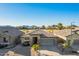 Charming single-Gathering home boasting a well-maintained front yard, tile roof and a two car garage at 29794 N Little Leaf Dr, San Tan Valley, AZ 85143