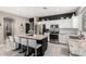 Stylish kitchen with granite countertops, stainless steel appliances, and center island seating at 29794 N Little Leaf Dr, San Tan Valley, AZ 85143