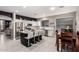 Modern kitchen with stainless steel appliances, granite countertops, and breakfast bar with seating at 29794 N Little Leaf Dr, San Tan Valley, AZ 85143