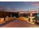 Tranquil patio featuring a fountain, decorative elements, and scenic desert views at sunset at 29794 N Little Leaf Dr, San Tan Valley, AZ 85143