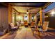 Inviting outdoor patio space with ample seating, perfect for enjoying evenings and entertaining guests at 29794 N Little Leaf Dr, San Tan Valley, AZ 85143