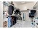 Large walk-in closet with built-in shelving and ample storage space at 29794 N Little Leaf Dr, San Tan Valley, AZ 85143