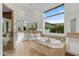 Well lit bathroom featuring a soaking tub, walk in shower, and oversized mirror with vanity at 30311 N 52Nd Pl, Cave Creek, AZ 85331