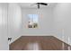 Bright bedroom with hardwood floors, plantation shutters, and ample natural light at 30311 N 52Nd Pl, Cave Creek, AZ 85331