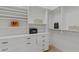 This walk in closet has built in storage and shelving, and carpeted floors at 30311 N 52Nd Pl, Cave Creek, AZ 85331