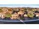 Beautifully landscaped home with a well-manicured front yard and a three-car garage at 30311 N 52Nd Pl, Cave Creek, AZ 85331