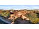 Stunning single-story home featuring desert landscaping, lush trees, and a two-car garage at 30311 N 52Nd Pl, Cave Creek, AZ 85331