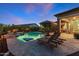 Backyard featuring a swimming pool with a lounge area, perfect for relaxation at 30311 N 52Nd Pl, Cave Creek, AZ 85331