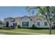Lovely home featuring manicured landscaping, a tile roof, and white exterior paint at 3173 E Page Ave, Gilbert, AZ 85234