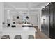 Spacious kitchen with stainless steel appliances and center island with bar stool seating at 3173 E Page Ave, Gilbert, AZ 85234