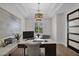 Bright home office with modern desk, natural light, and elegant decor at 3173 E Page Ave, Gilbert, AZ 85234