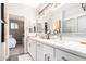 Beautiful bathroom with double vanity, modern lighting, and access to the bedroom at 333 N Pennington Dr # 15, Chandler, AZ 85224