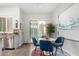 Cozy dining area with modern table, seating for four, and view to stainless appliances at 333 N Pennington Dr # 15, Chandler, AZ 85224