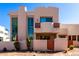 Attractive two-story home with a private gate and desert landscaping, offering curb appeal and security at 333 N Pennington Dr # 15, Chandler, AZ 85224