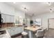 Kitchen with granite counters, island with seating, and stainless steel appliances at 333 N Pennington Dr # 15, Chandler, AZ 85224