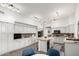 Spacious kitchen with gray cabinets, granite countertops and a modern island with seating at 333 N Pennington Dr # 15, Chandler, AZ 85224
