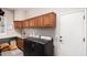 Well-equipped laundry room with modern washer and dryer, ample cabinet space, and a convenient utility sink at 333 N Pennington Dr # 15, Chandler, AZ 85224
