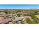 An aerial view of homes featuring backyard pools in a desirable community with mountain views in the distance at 3353 E Nolan Dr, Chandler, AZ 85249