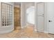 Bathroom showcasing a glass block shower and tile flooring at 3353 E Nolan Dr, Chandler, AZ 85249