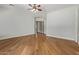 Spacious bedroom featuring wood floors and white trim in a home at 3353 E Nolan Dr, Chandler, AZ 85249