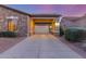 Spacious three-car garage with an extended driveway, providing ample parking space for residents and visitors at 3353 E Nolan Dr, Chandler, AZ 85249