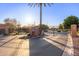 Community gated entrance with desert landscaping and signage at 3353 E Nolan Dr, Chandler, AZ 85249