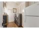 Bright laundry room with front loading washer/dryer and storage cabinets at 3353 E Nolan Dr, Chandler, AZ 85249