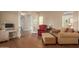 Living room featuring comfortable seating, a desk, and glass-paneled french doors at 3353 E Nolan Dr, Chandler, AZ 85249