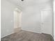 Neutral bedroom featuring carpet, a white door, and a hall entryway at 3471 E Azalea Dr, Gilbert, AZ 85298