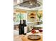 Stylish kitchen with modern appliances, floating shelves, and ample counter space for meal prep at 37801 N Cave Creek Rd # 11, Cave Creek, AZ 85331