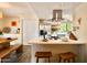 Well-lit kitchen featuring barstool seating and stainless steel appliances and fixtures at 37801 N Cave Creek Rd # 11, Cave Creek, AZ 85331