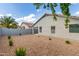 Backyard featuring desert landscaping, providing a serene and low-maintenance outdoor space at 3847 W Yellow Peak Dr, San Tan Valley, AZ 85144