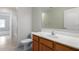 The bathroom has a vanity, toilet and tile flooring at 3847 W Yellow Peak Dr, San Tan Valley, AZ 85144