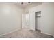 The bedroom features carpet and a sliding door closet with a shelf and hanging rod at 3847 W Yellow Peak Dr, San Tan Valley, AZ 85144