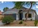 Beautiful single-story home with a two-car garage and well-manicured desert landscaping at 3847 W Yellow Peak Dr, San Tan Valley, AZ 85144