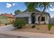 Charming single-story home with a two-car garage and well-manicured desert landscaping at 3847 W Yellow Peak Dr, San Tan Valley, AZ 85144