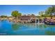 Picturesque water feature with natural rock accents enhances the community entrance at 3847 W Yellow Peak Dr, San Tan Valley, AZ 85144