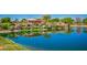 Community water feature with lush greenery and serene lake reflections at 3847 W Yellow Peak Dr, San Tan Valley, AZ 85144