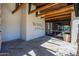 Community entrance with glass doors, stone flooring, and a decorative sign at 3935 E Rough Rider Rd # 1264, Phoenix, AZ 85050