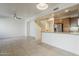 Open floor plan with kitchen featuring wooden cabinets, stainless appliances and granite counters at 3935 E Rough Rider Rd # 1264, Phoenix, AZ 85050
