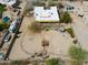 Expansive aerial view of desert property with RV parking, garden, and outdoor living areas at 40627 N 6Th Ave, Phoenix, AZ 85086